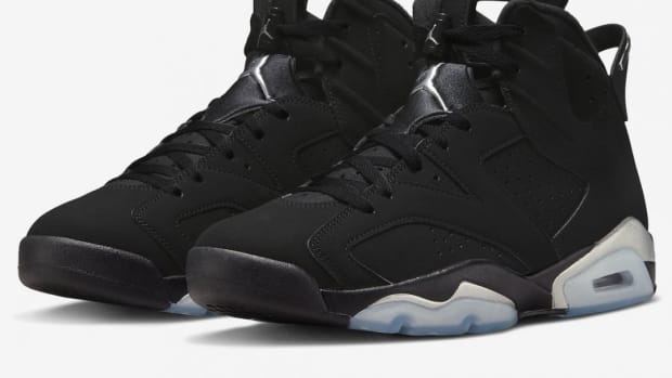 Black and silver Air Jordan shoes.